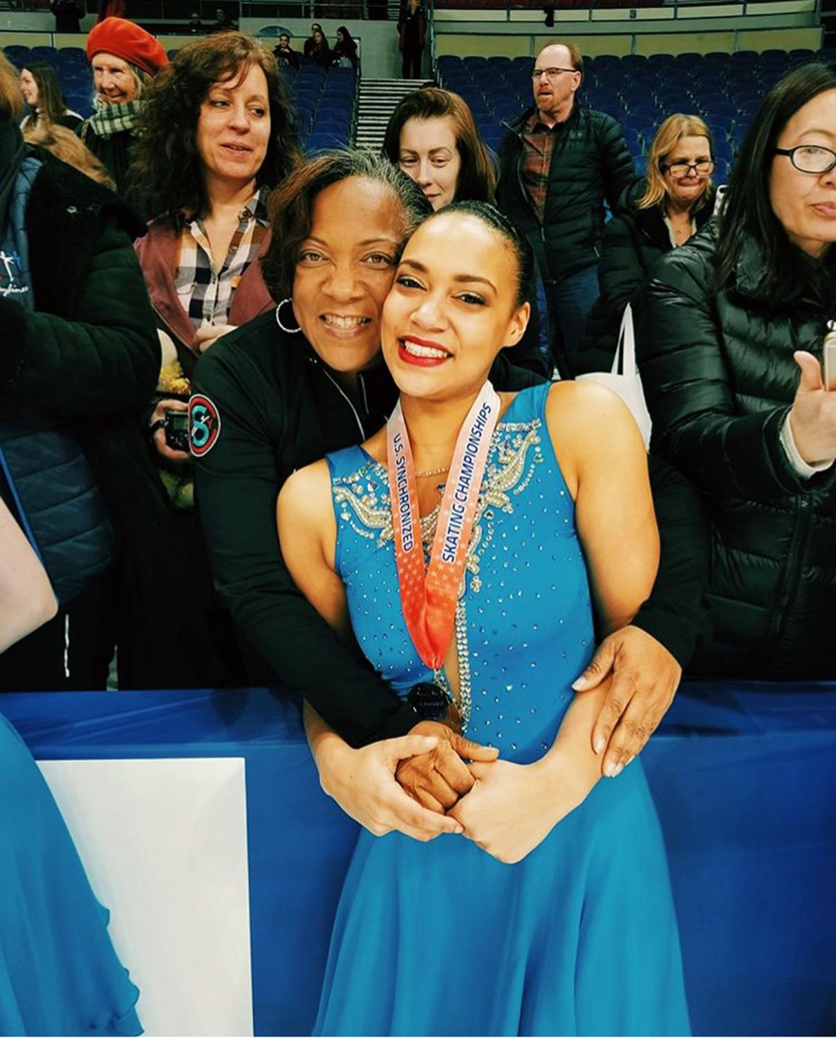 Senior Taylor Blake celebrates, alongside her mom, her qualification for the world championships.