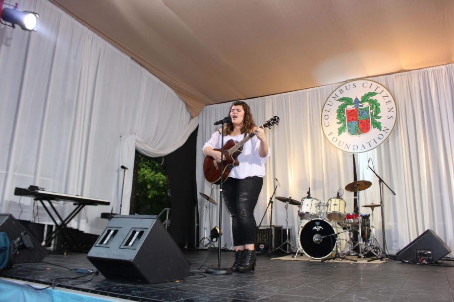  Sophomore Alyssa Lynn Catalanotto sings at the Fifth Avenue Columbus Day Parade in NYC.