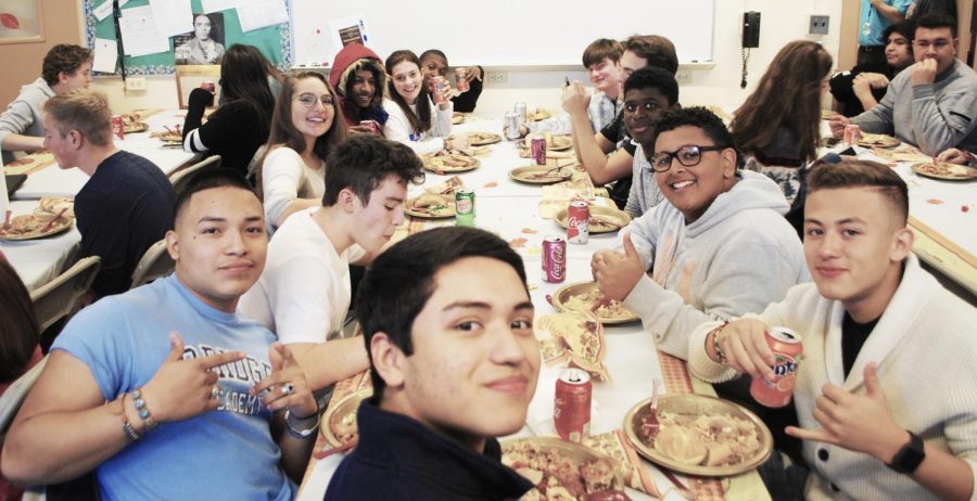 Members of the B.R.I.D.G.E. Academy celebrate Thanksgiving together.