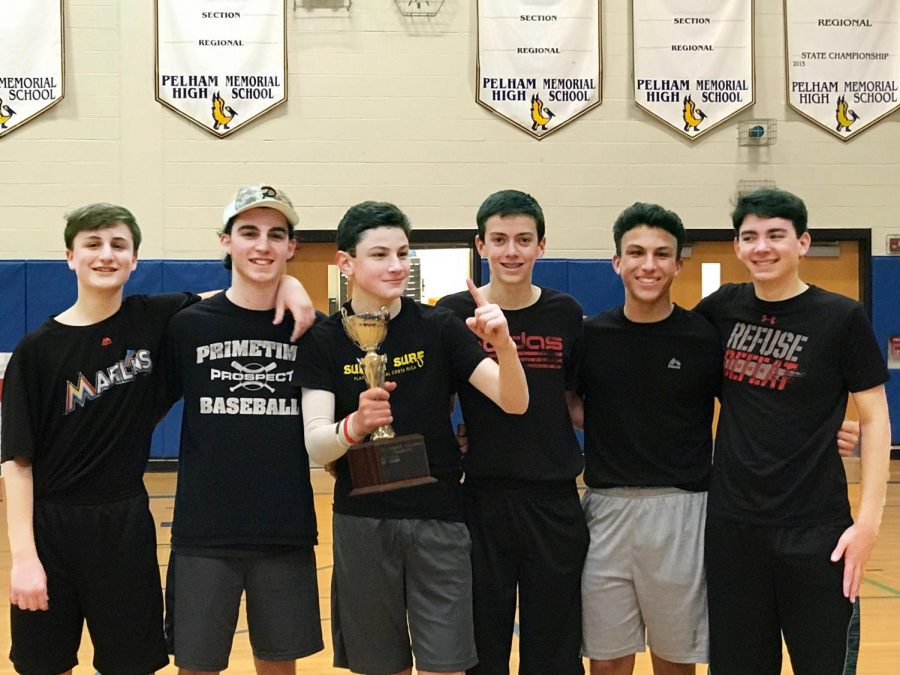 Winners+of+the+CCC+dodgeball+tournament%2C+the+Purple+Cobras%2C+pose+with+their+well-earned+trophy.