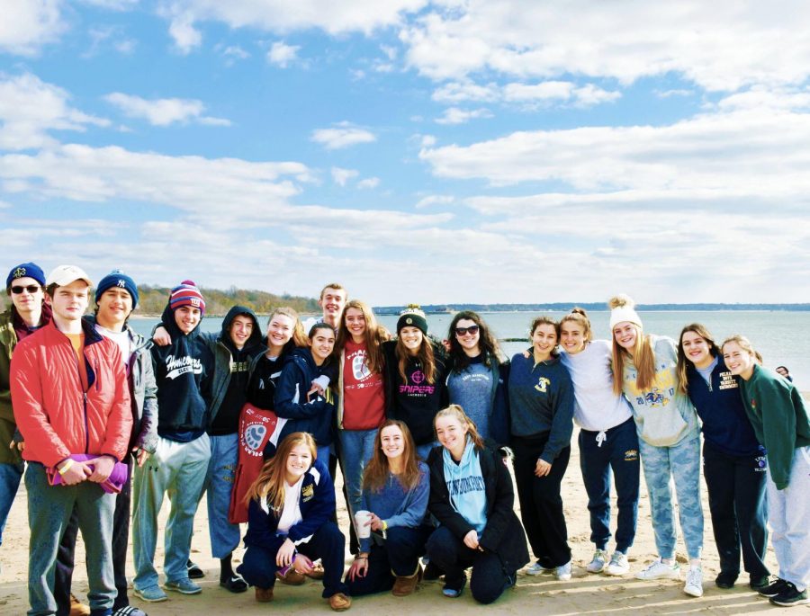 PMHS students FREEZE for a photo while getting ready to dive into the Long Island Sound to raise money for Special Olympics.
