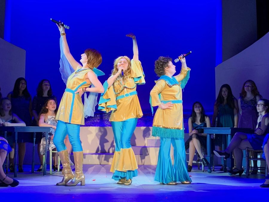 Tanya (Junior Meredith Heller), Donna (senior Maggie Solimine) and Rosie (senior Athena Woodfin) re-unite as Donna and the Dynamos on the eve of Donnas daughters wedding. 