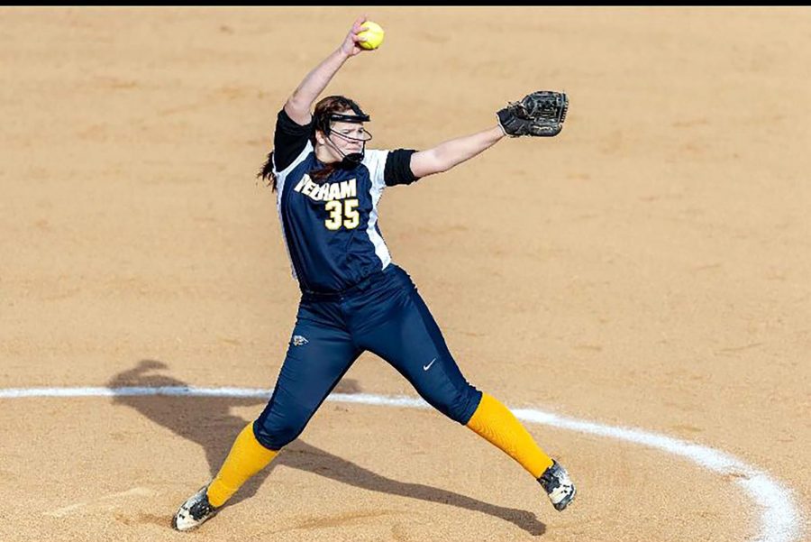 Senior+KP+Boggs+winds+up+for+a+big+pitch+on+the+softball+mound.