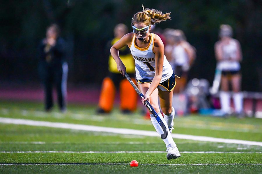 Junior Eileen Mazzaro sprints down the field towards the goal.