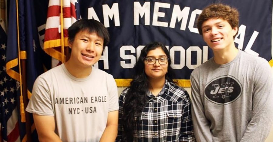 (l to r) Seniors Peter Wei, Asher Lal, and Lance Brady celebrate their achievements as National Merit Scholars.