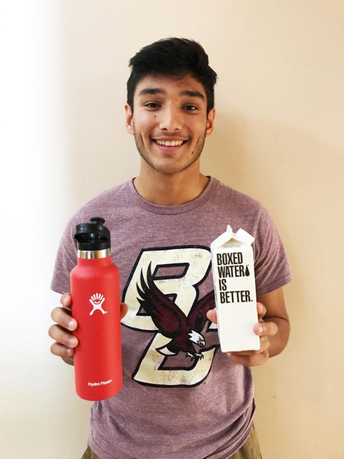 Senior Philip Dulock makes the move from 
single-use plastic bottles to a metal thermos and boxed water.