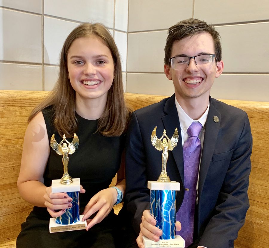 Junior Georgia Connolly (l) and senior Nick 
Lieggi (r) are victorious, placing 5th and 2nd respectively at their first tournament.