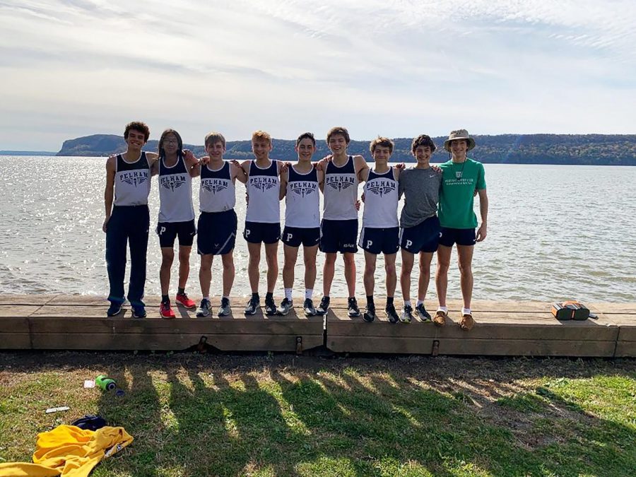 (l to r) Teddy D’Angelo, Gian-Carlo Riehl, Tommy Fontanella, Ben Levine, Stephen Tahbaz, Lance Brady, 
Stephen Liaskos, Daniel Johnston, and Chris Hartigan stand tall after a meet.