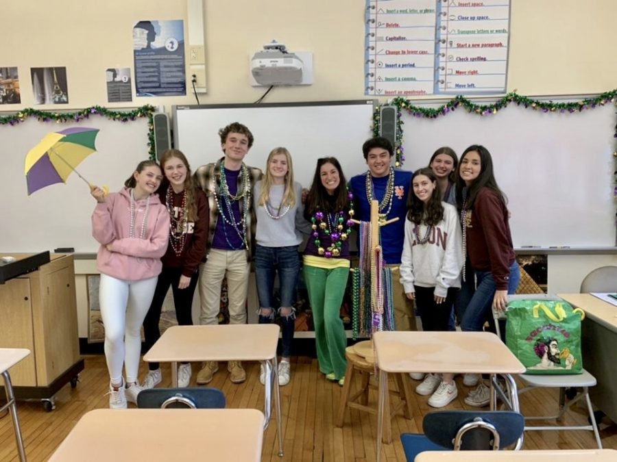 (l to r) Sophomores Zoe Winburn, Kate Smith, Christian Shiels, club advisor Mrs. Livaditis, sophomores Thomas Shelton, Georgia Russello, Mikaela Lavandero, and Caroline Michailoff organized the Mardi Gras event.