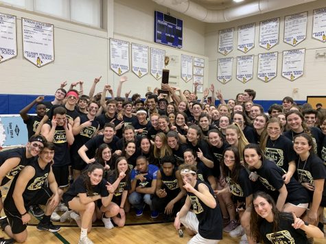 The seniors hold aloft the Charlie Wilson Trophy, awarded to the winning Olympic grade. The trophy is named for Charlie Wilson, former Pelham District Superintendent, who initiated the Olympic games here at Pelham.