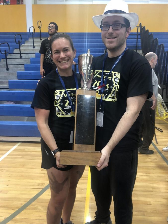 Mrs. Waters and Mr.Sirico holding the 2020 olympics trophy