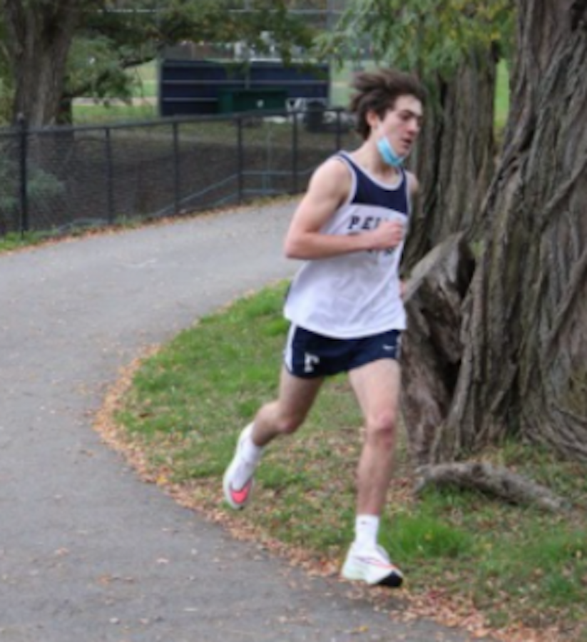 Junior Stephen Liaskos rounds the turn with speed and agility.