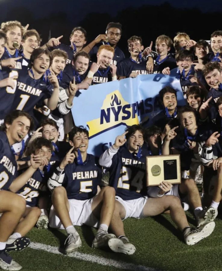 Boys lacrosse celebrates after their Section 1 win over Pearl River.